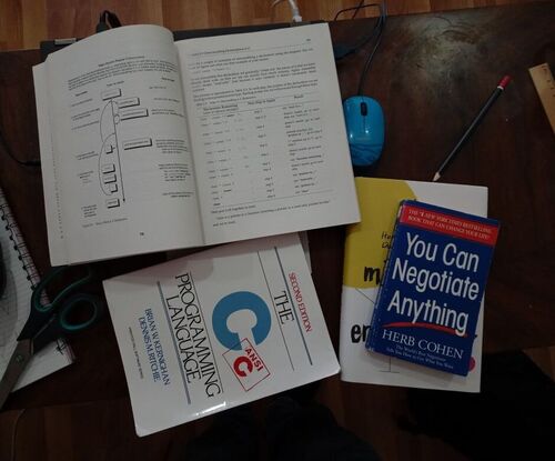 four books: The C Programming Language, Expert C Programming, You Can Negotiate Anything and The Minimalist Enterpreneur